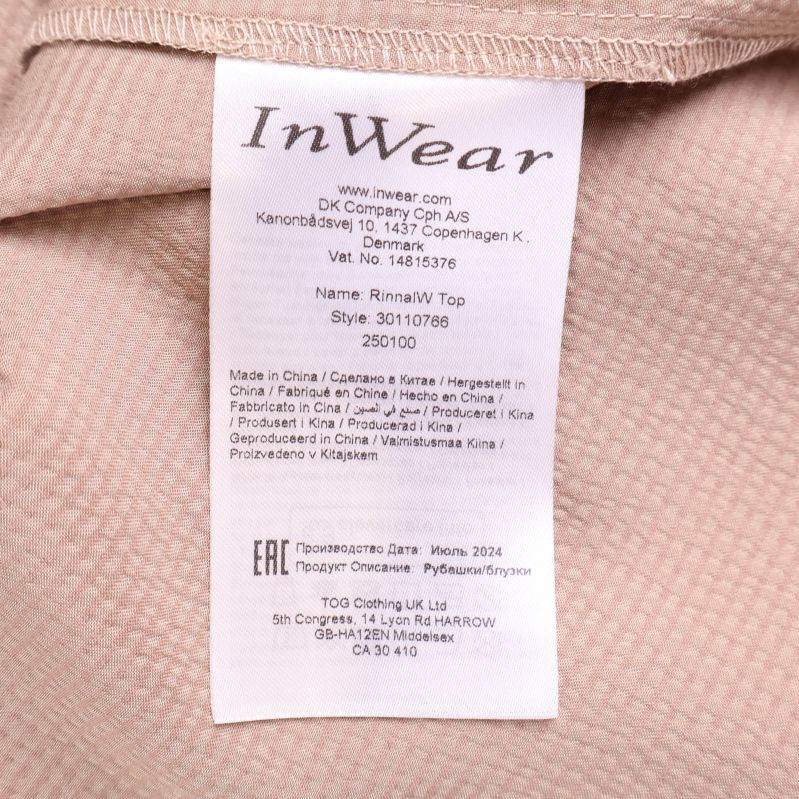 Inneretikett från InWear med produkt- och företagsinformation