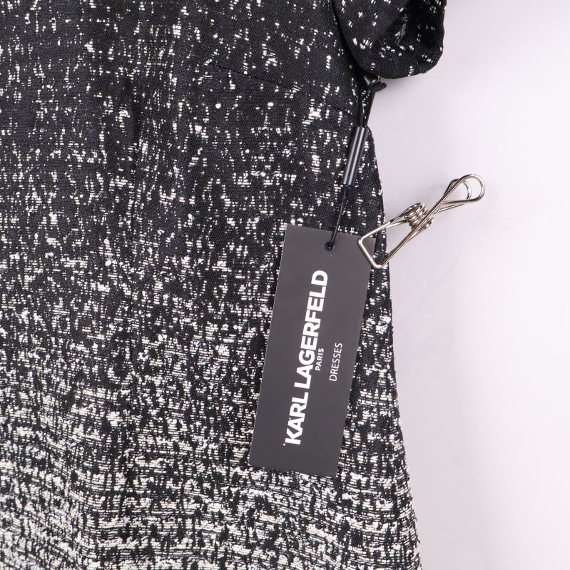 Närbild på prislapp med Karl Lagerfeld-logga