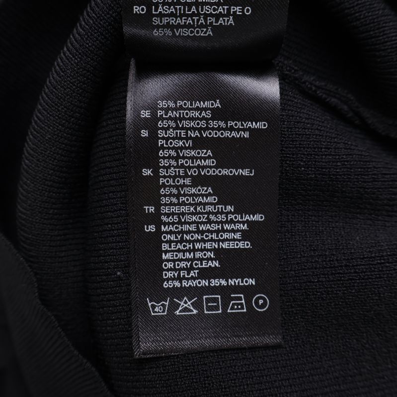 Materiallapp med information om viskos, polyamid och polyester