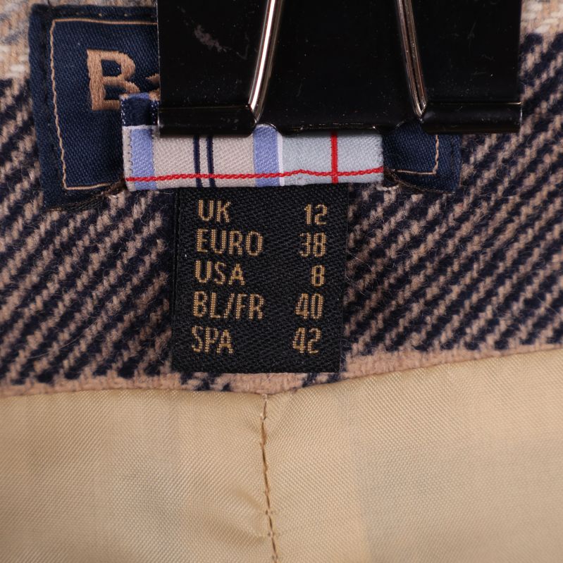 Storleksetikett som visar EU-storlek 38