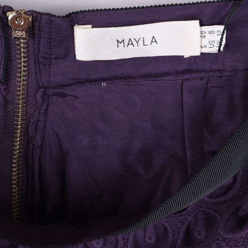 Insidan av kjolen med Mayla-märkesetikett synlig