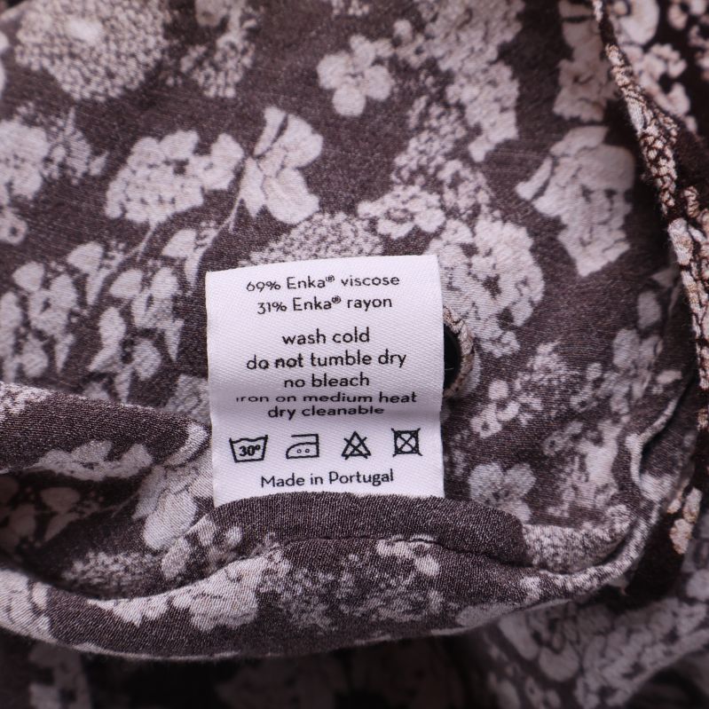 Materialetikett med viskos och rayon för blusen