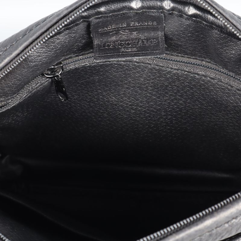 Närbild insida väska