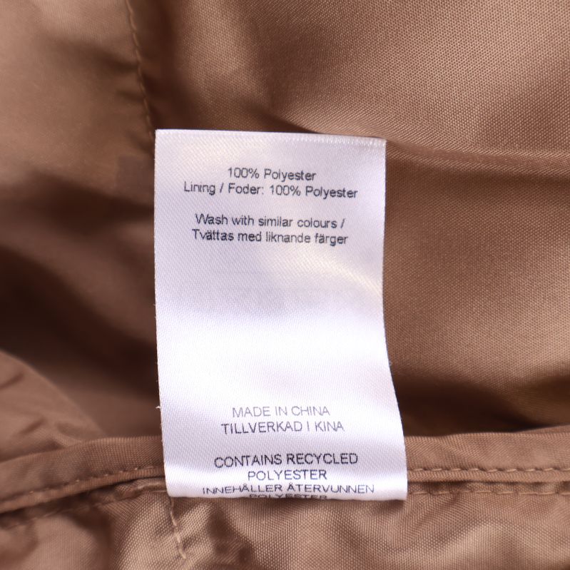 Materiallapp med text 100% polyester, fodrad, tvättråd