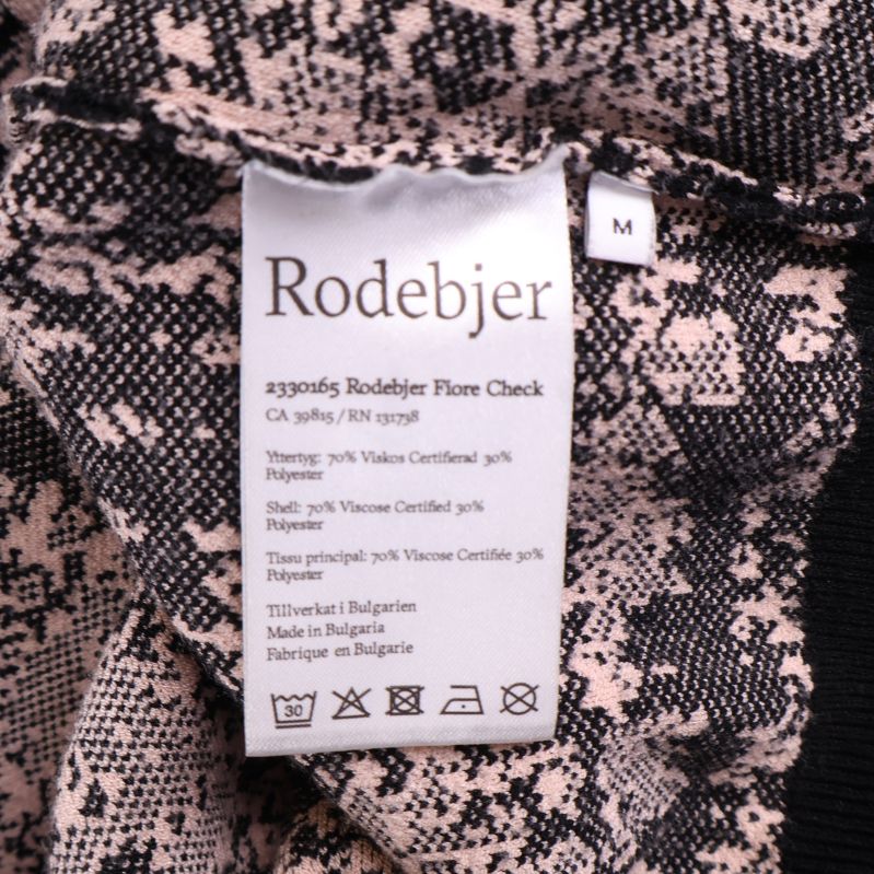Tvättrådslapp Rodebjer Flore Check med materialangivelser