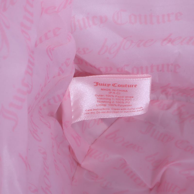 Materiallapp med Juicy Couture-etikett och materialangivelse