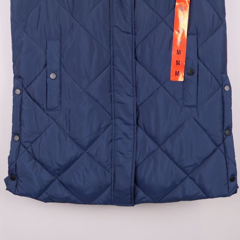 Nedre delen av väst med fickor och knappstängning