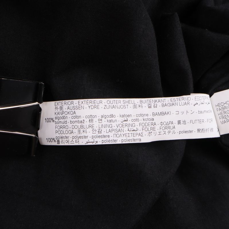 Materiallapp med information om bomull och polyester