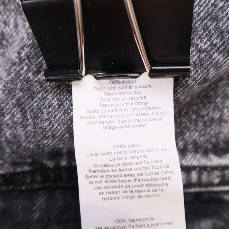 Materialetikett visar 100% bomull