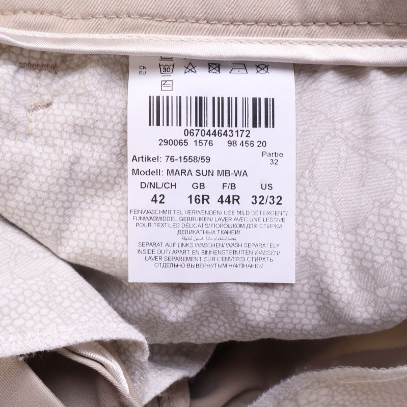 Materiallapp med storleksinformation och skötselråd