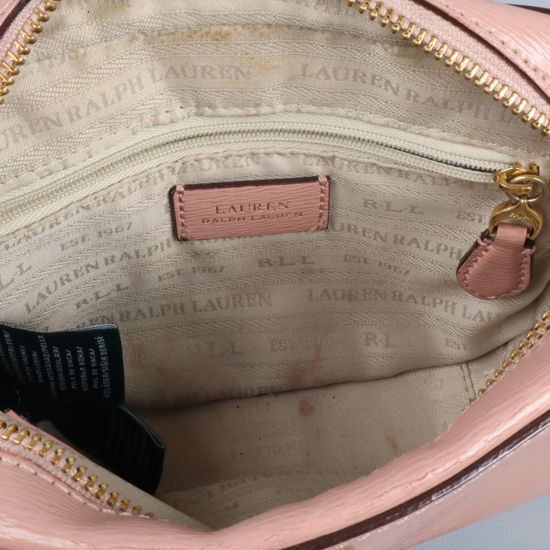 Insida av väska med logotypfoder och innerficka