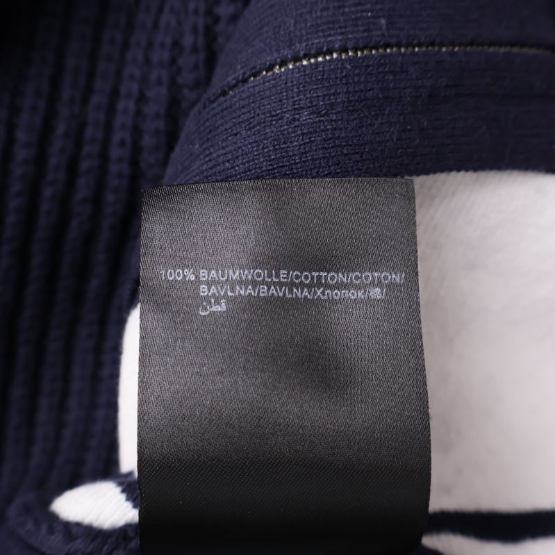 Materialetikett visar 100% bomull