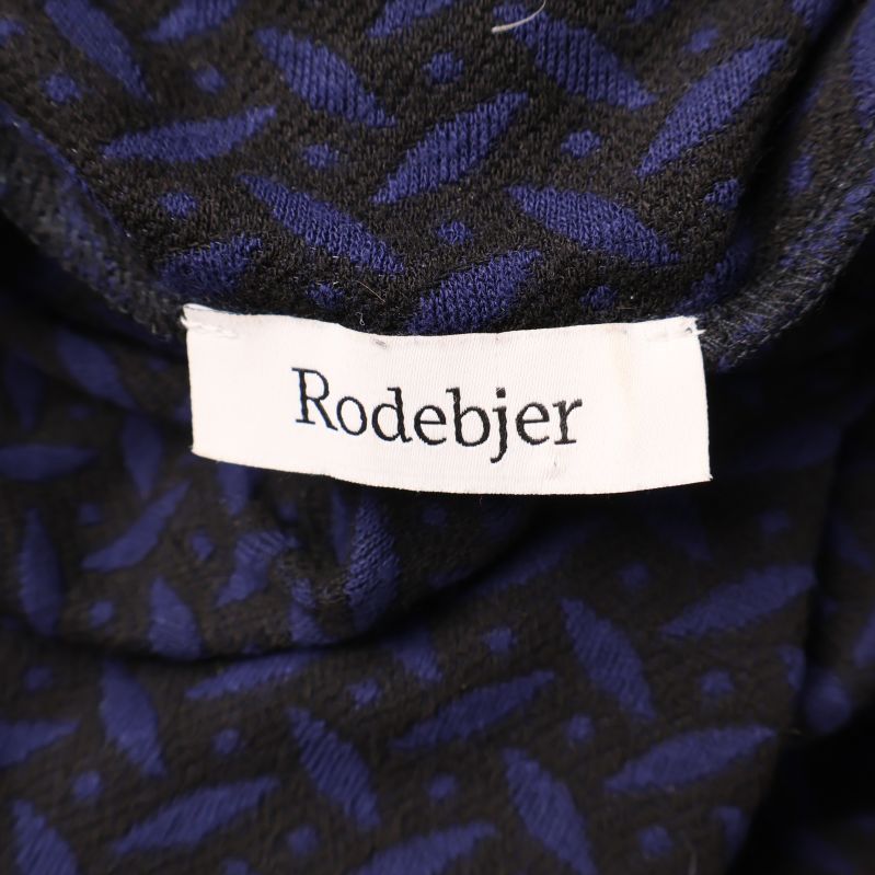 Rodebjer-varumärkesetikett i svart och vitt