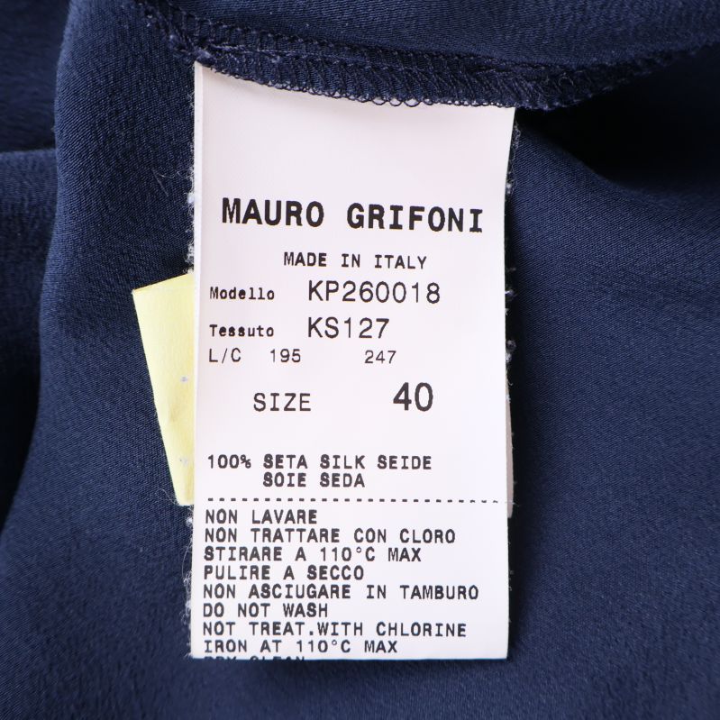 Materialetikett 100% siden, storlek 40, och tvättråd