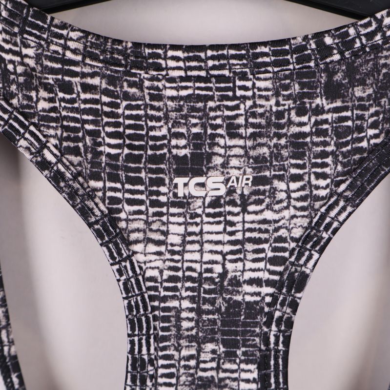 Detalj av TCS AIR-tryck på insidan av ryggen