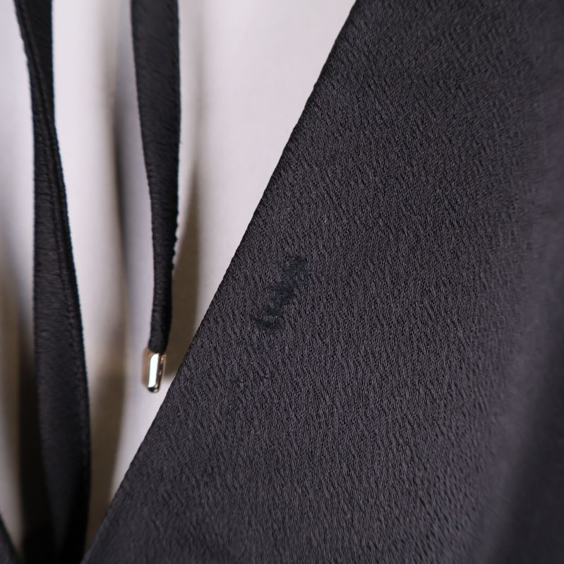 Närbild på mindre slitage vid v-ringningen