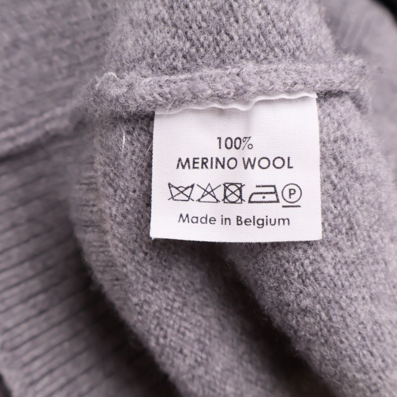Tvättrådsetikett med 100% merinoull och skötselråd