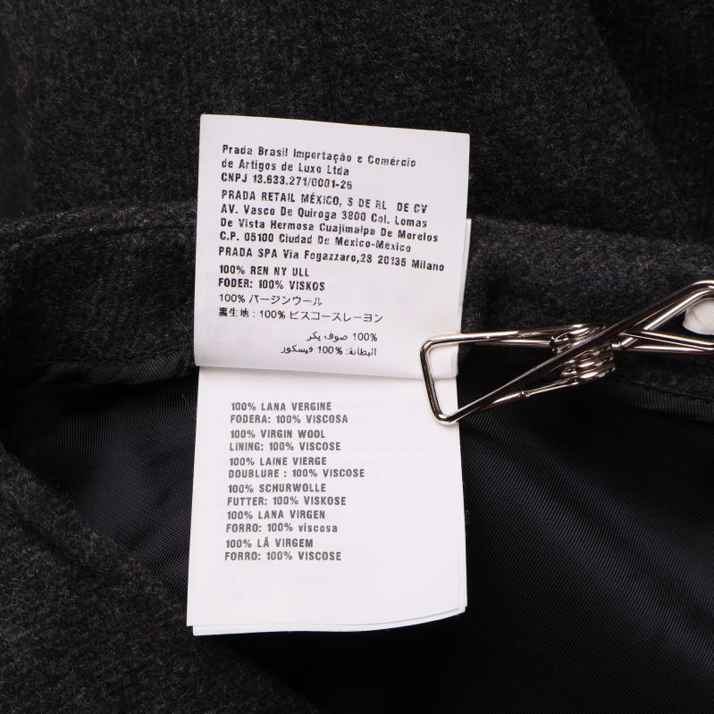 Materiallapp som visar sammansättning på kjolen