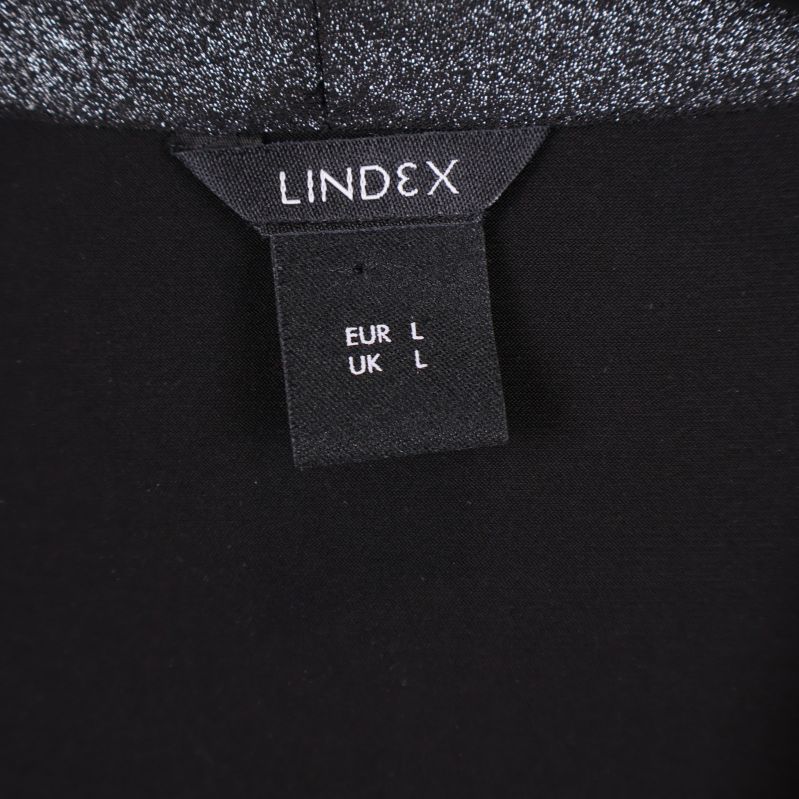 Etikett med märke Lindex och storlek L