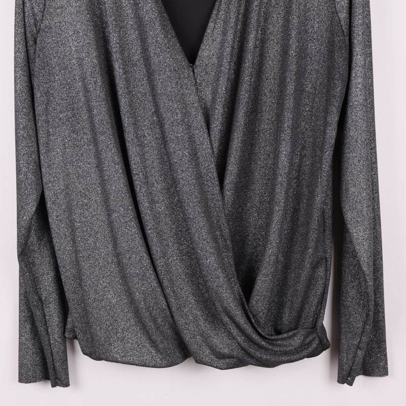 Framöverläggning detalj som liknar omlott