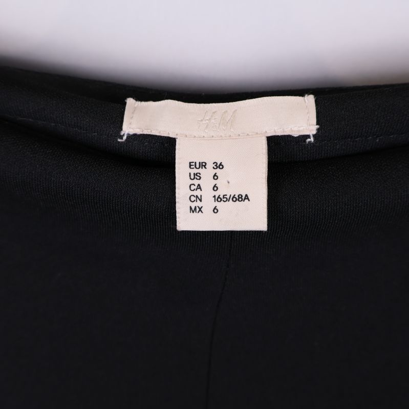 Storleksetikett från H&M visar EU 36