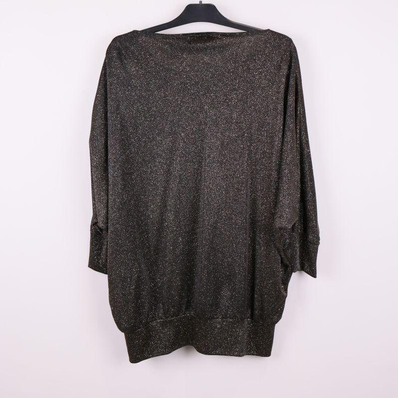 Baksidan av svart glittrande butterfly blus