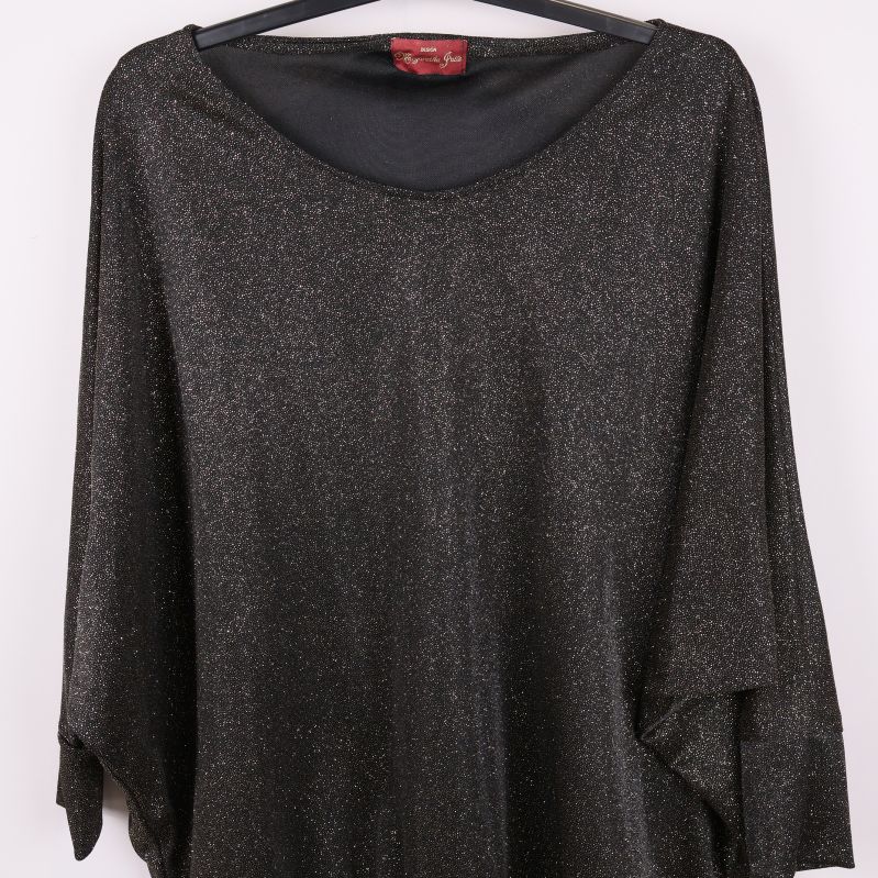 Närbild på toppens glittrande textur och ringning