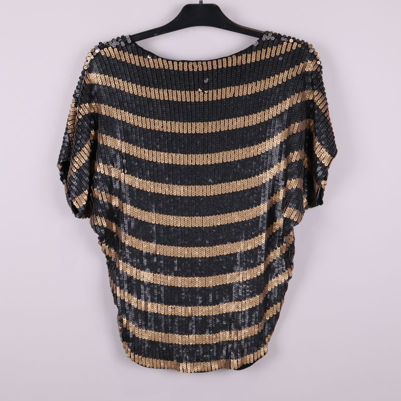 Baksida av topp med horisontella paljettränder i svart och brons