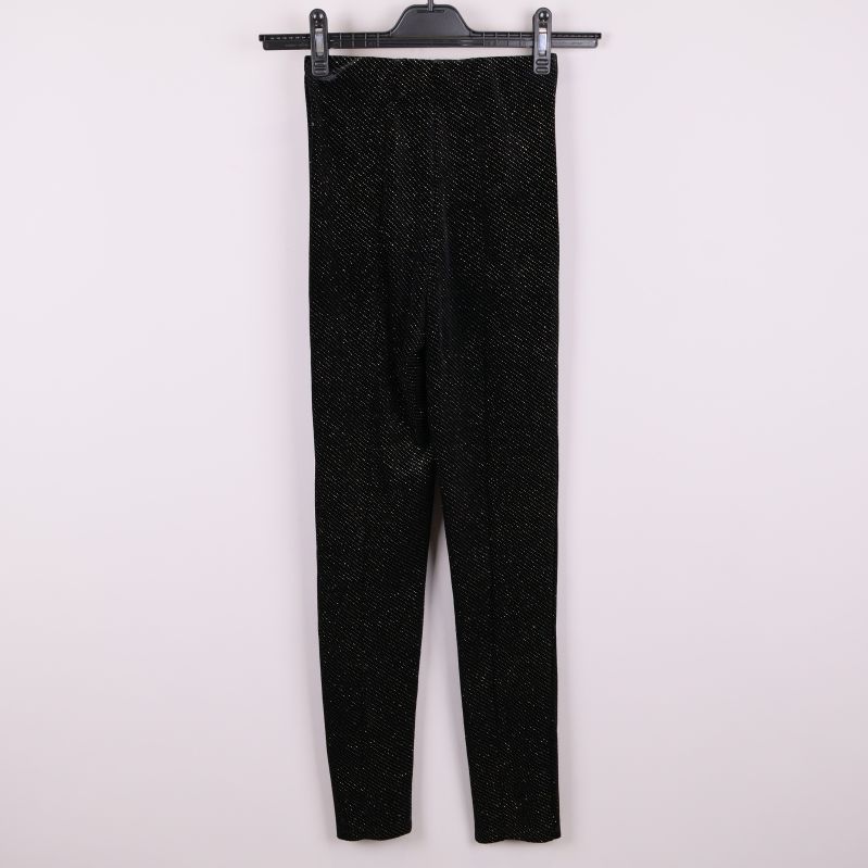 Baksida av svarta glittriga tights