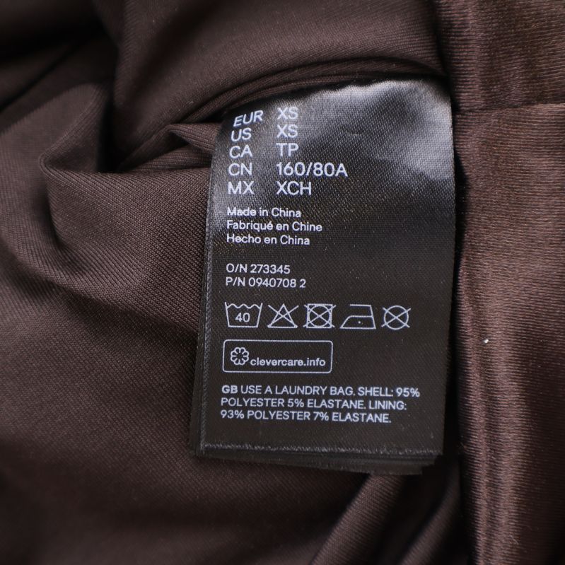 Materiallapp med sammansättning 93% polyester 7% elastan