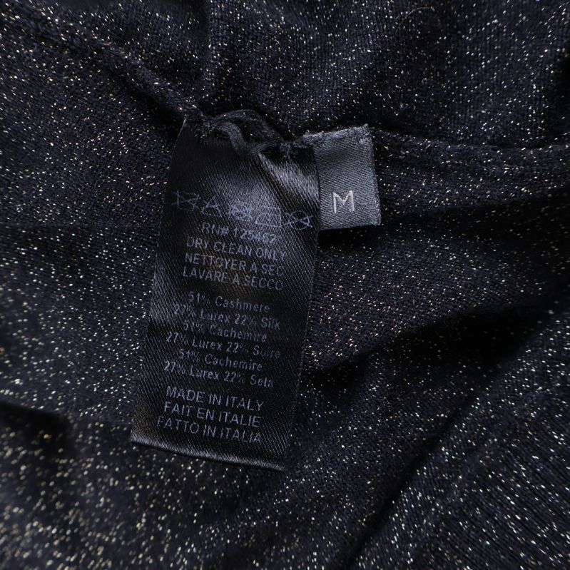 Materiallapp med detaljer om innehåll och tvättråd