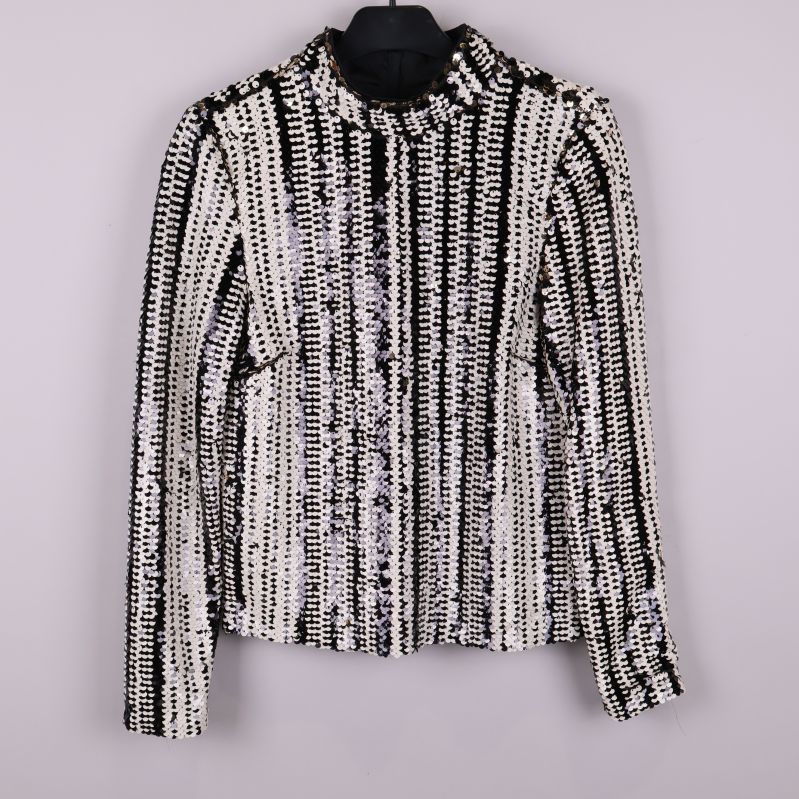 Paljettblus med svarta och vita ränder framifrån