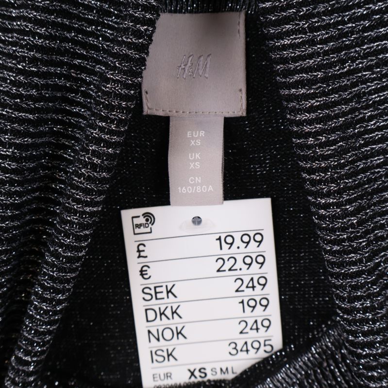 Storleksetikett XS och prislapp