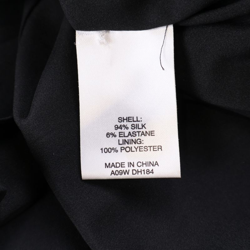 Materialetikett med innehåll silk, elastane och polyester
