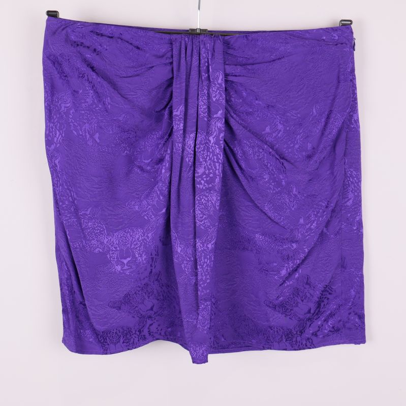 Lila kjol med draperad front