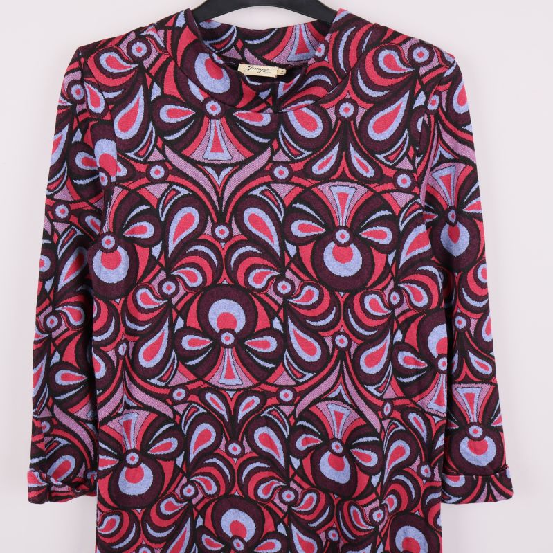 Överdel av klänning med lång ärm och starkt mönster