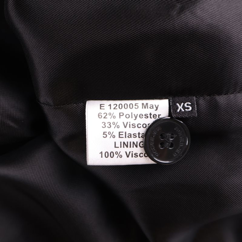 Materiallapp visar polyester viskos elastan XS
