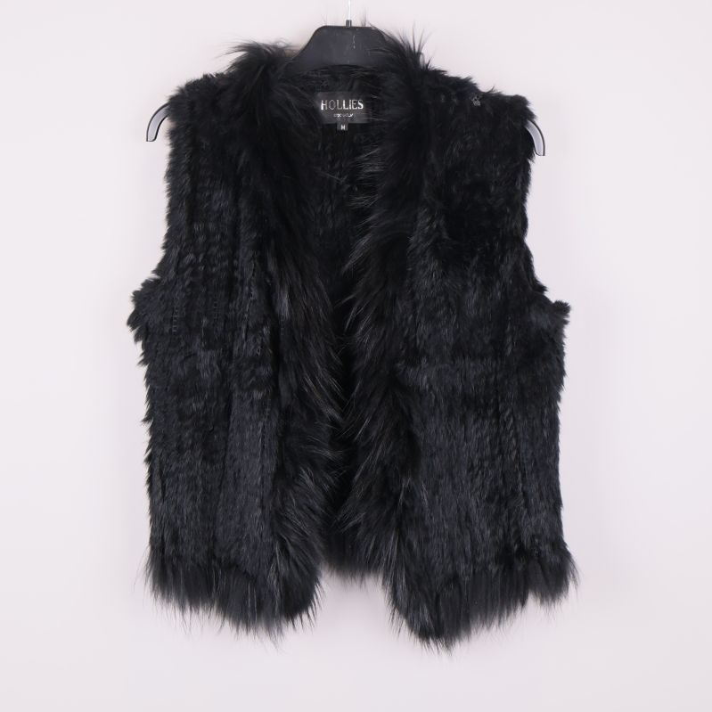 Svart pälsväst med fluffig päls 