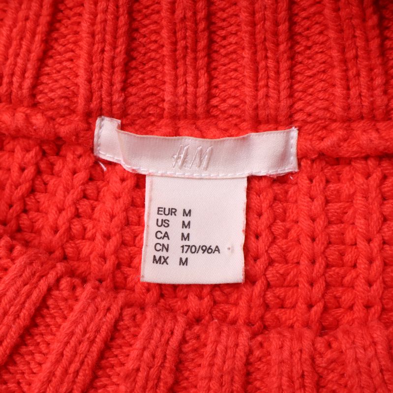 Närbild på storleksetikett H&M EUR M