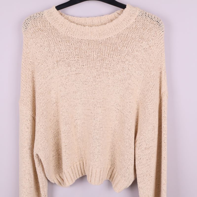 Närbild på tröjans framsida och struktur