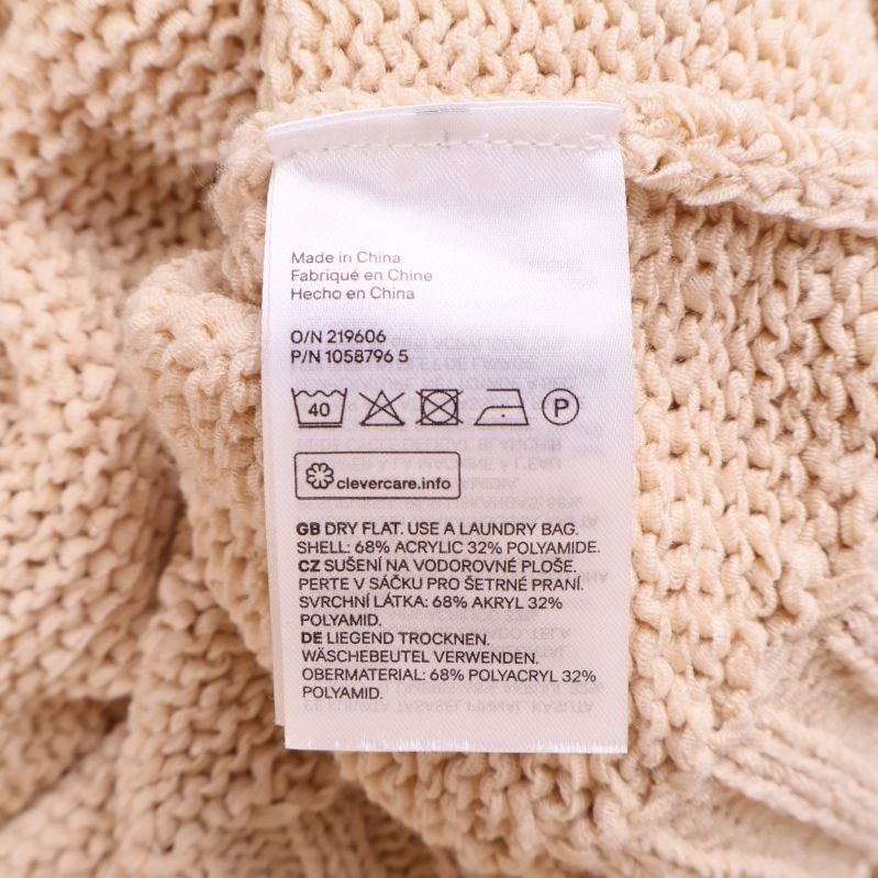 Materiallapp med sammansättning och tvättråd