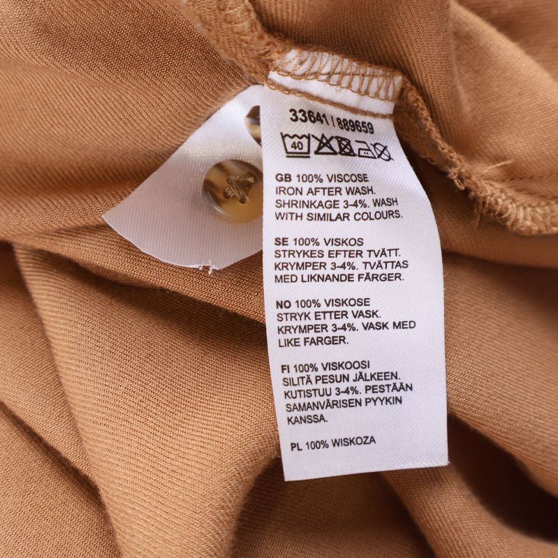 Materiallapp med information om 100% viskos