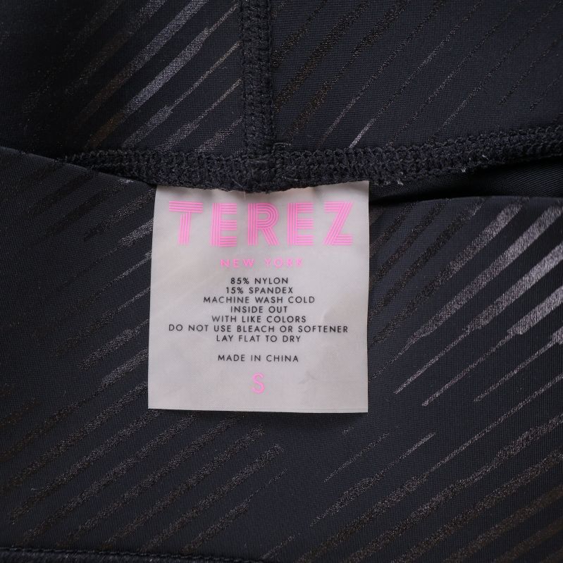 Materialetikett för Terez leggings med storlek och komposition