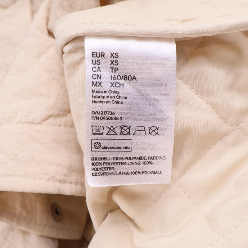 Tvätt- och materiallapp i beige quiltad overshirt