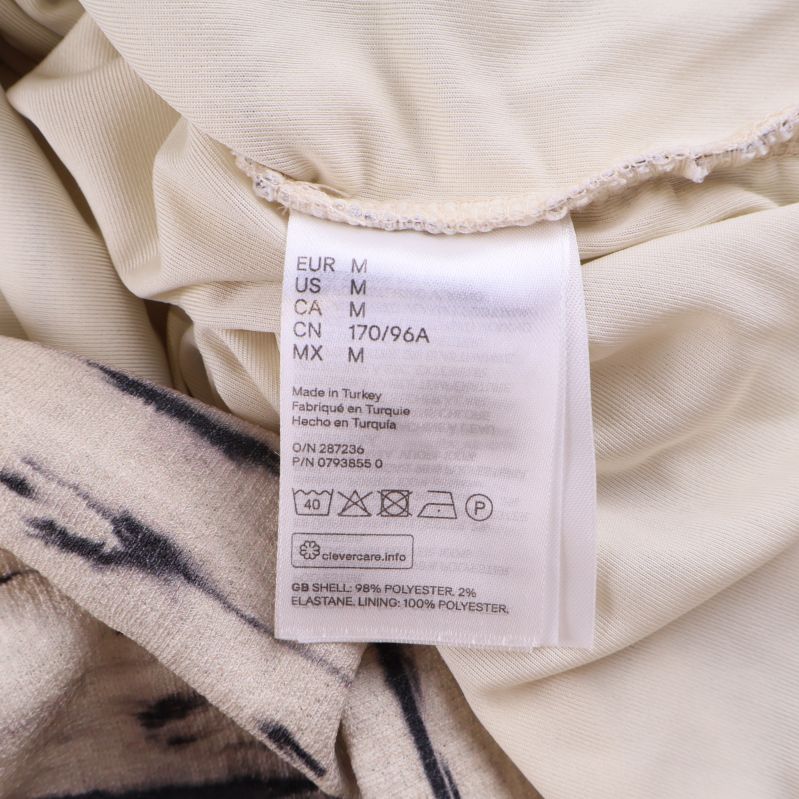 Materiallapp klänning 94% polyester, 6% elastan, foder 100% polyester