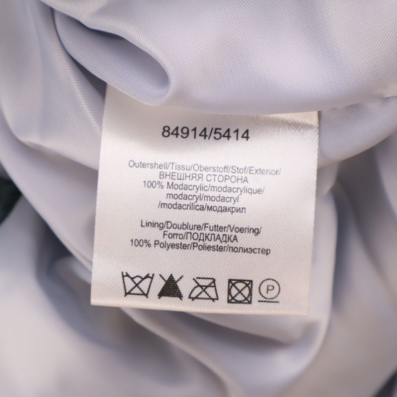 Materiallapp med information om jackans material