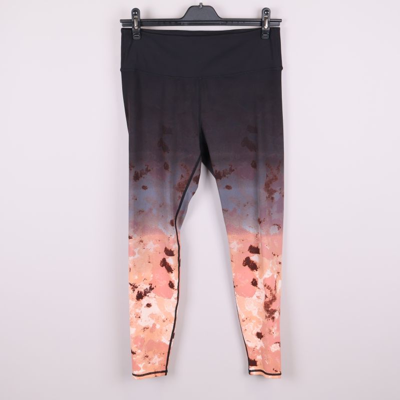 Sporttights med mönster i svart och pastellfärger framifrån