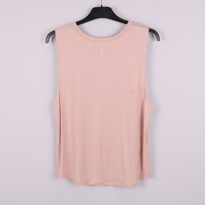 Ärmlös blushfärgad topp bakifrån