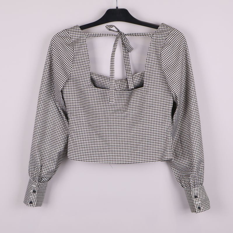 Rutig topp med knytband bak och öppen rygg