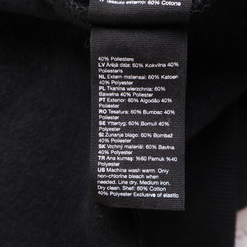 Materiallapp visar 60% bomull och 40% polyester